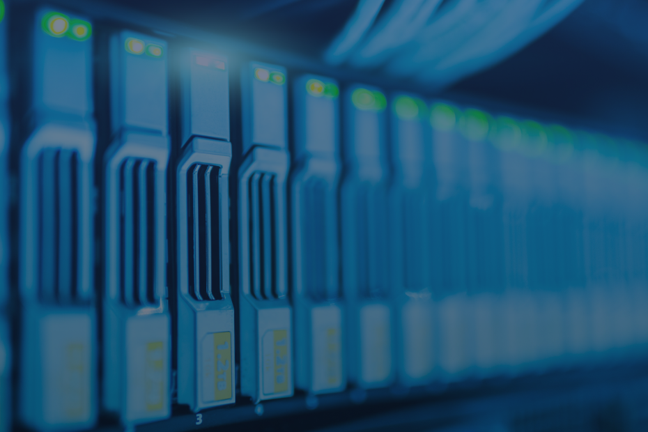 Detailed image of a server rack with glowing lights in a modern data center.
