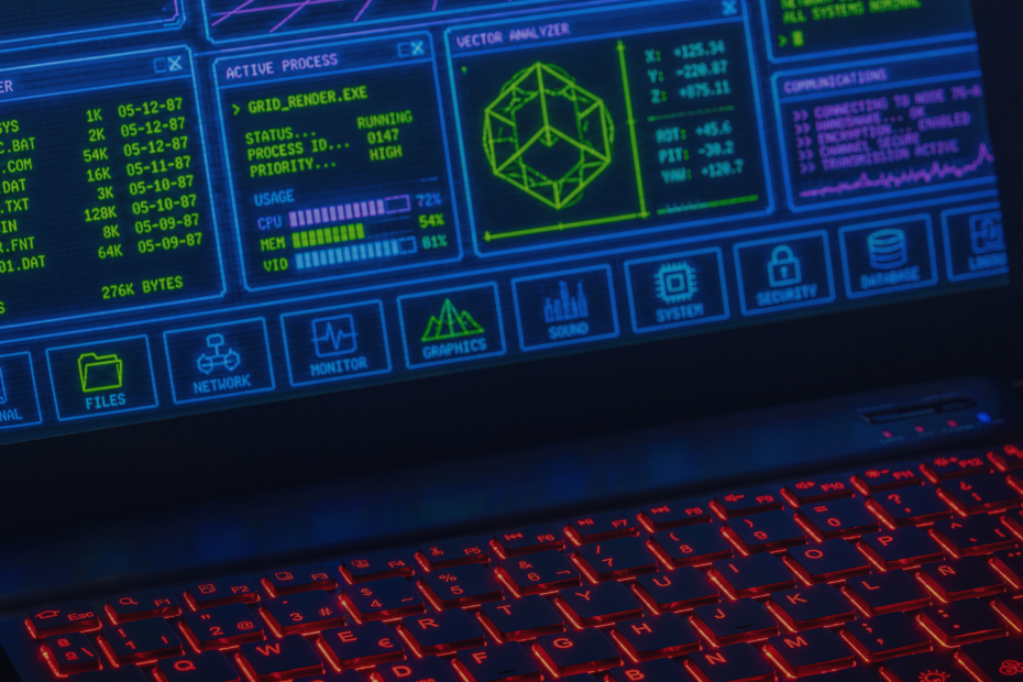 Futuristic digital interface displayed on laptop screen with neon red keyboard.
