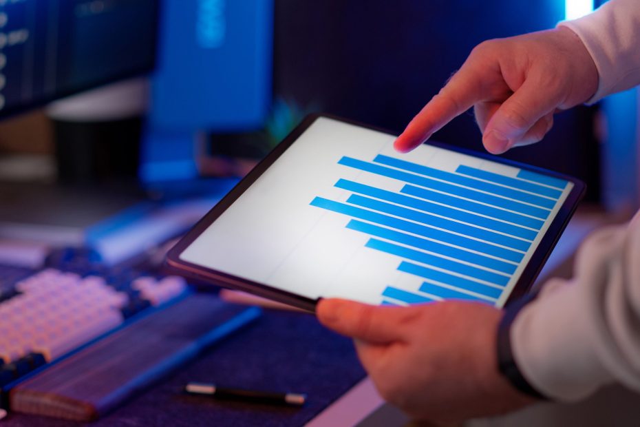 Business professional reviewing data analytics dashboard - five signs your organisation needs a better approach to business data analytics.